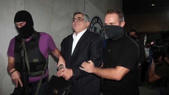 Šéfa gréckej neonacistickej strany odsúdili na 13 rokov väzenia