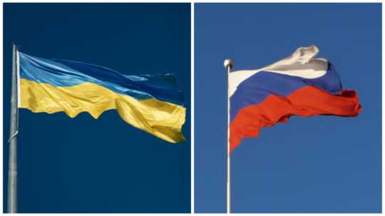 Na ilustračnej snímke vlajky Ukrajiny a Ruska.