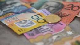 Ilustračná snímka austrálskych dolárov. RATS
